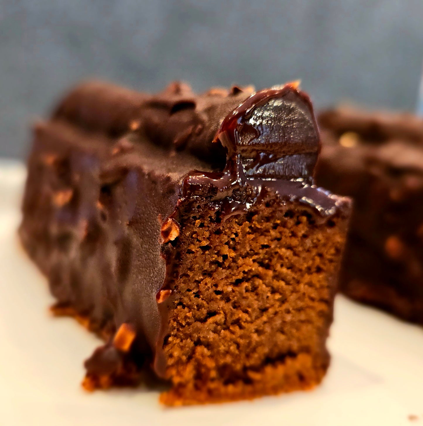 Slice pic of a caramel travel cake showing the chocolate cake and caramel tube.