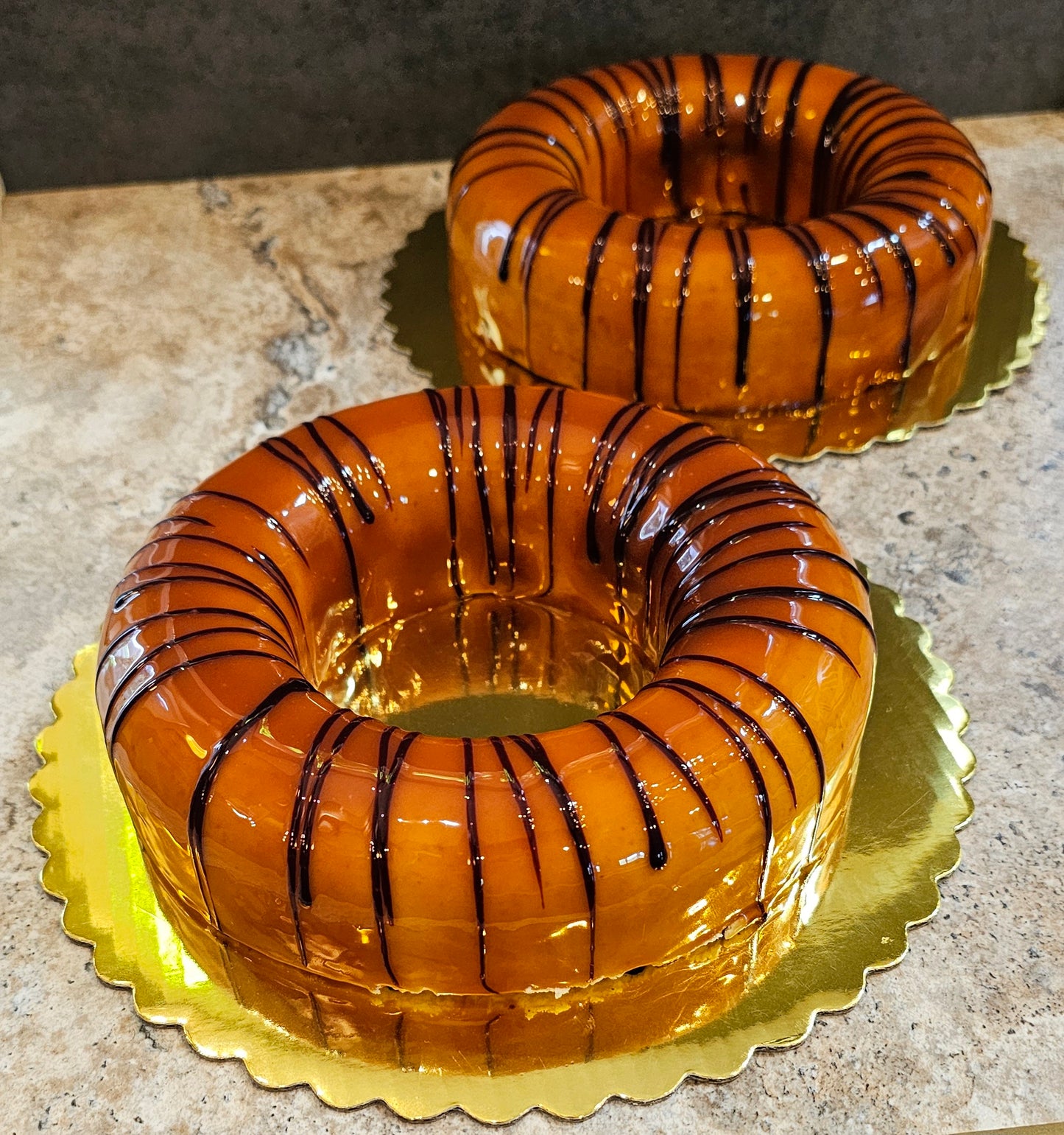 Two Hazelnut Mousse Cakes, circular with an open center.