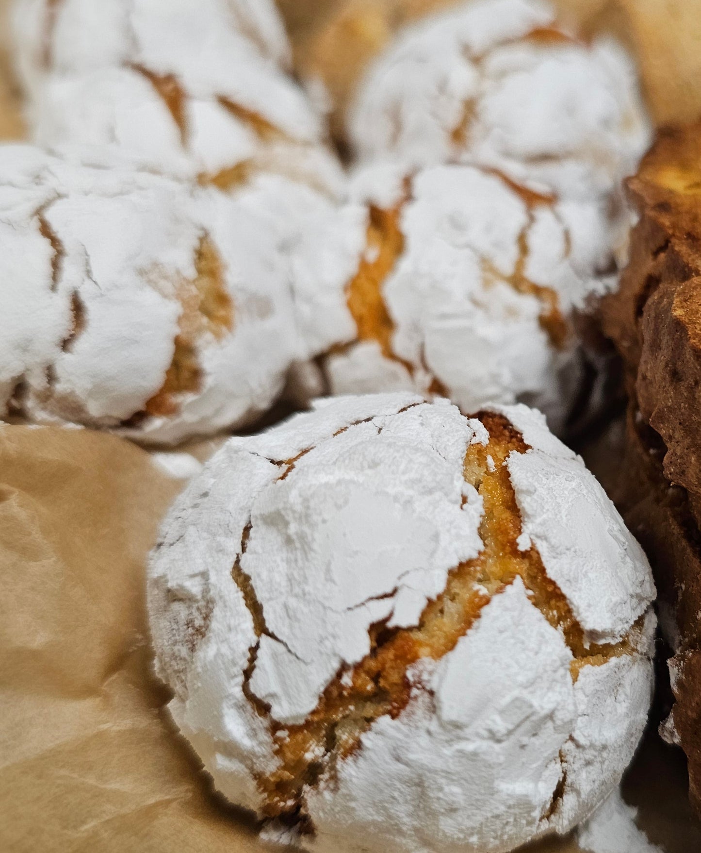 Close-up of crinkle cookies on a textured surface