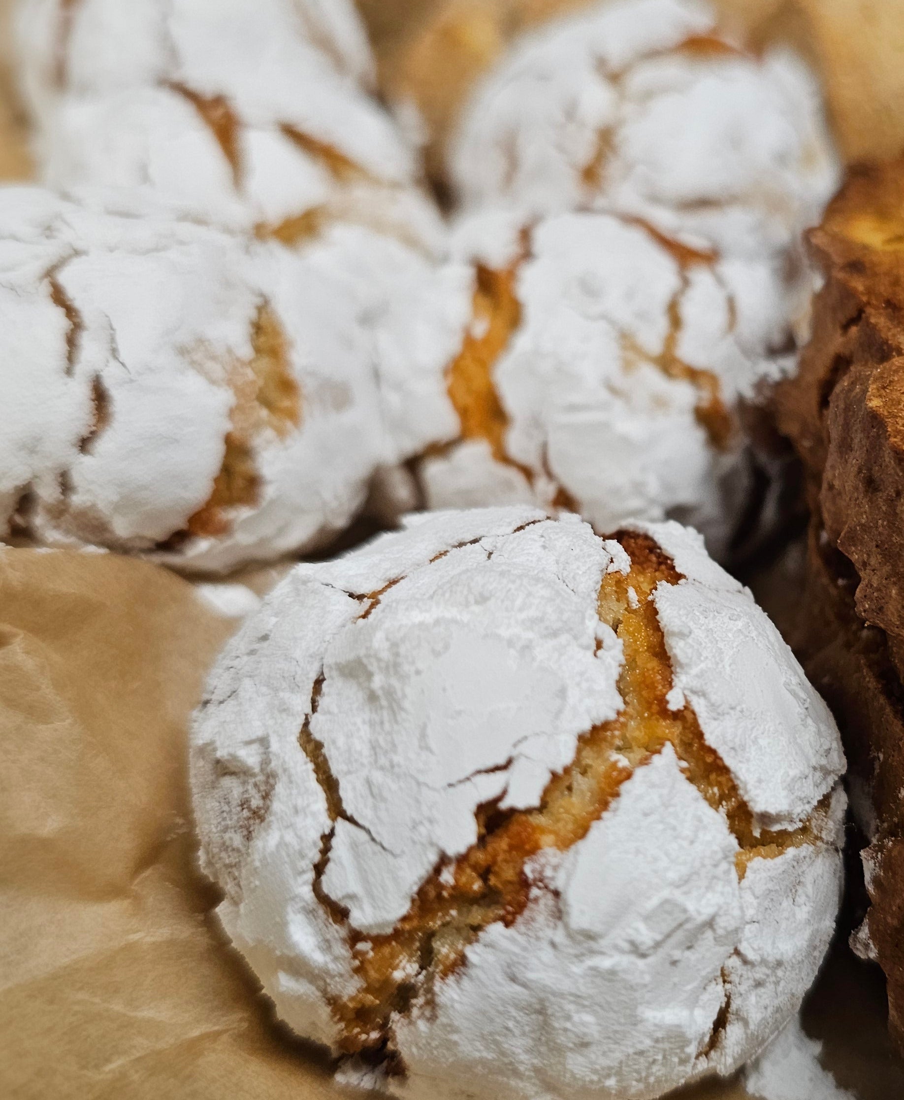 Close-up of crinkle cookies on a textured surface